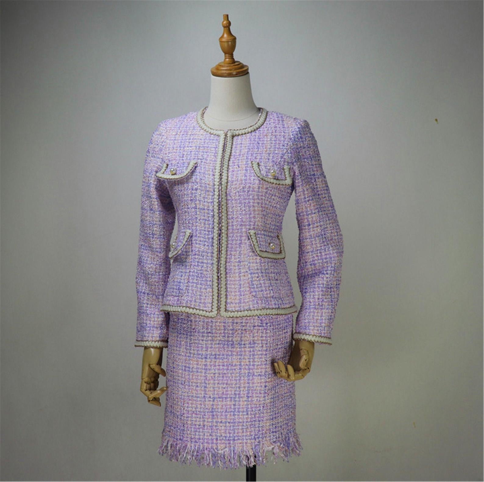 Custom Made Purple Tweed Blazer + Dress SuitWomen's Designer Inspired Purple Tweed Blazer Suit UK CUSTOMER SERVICE! Women's Designer Inspired Purple Tweed Blazer Suit - Breathe feminine flair into your wardrobe with this purple coloured round-neck blouse, pearl button with four pockets. It's crafted from light, look like diamond textured fabric. Suitable for day or night, it can be tucked into a pencil skirt with tassel. As per customer requirement our tailor will stitch the suit accordingly.