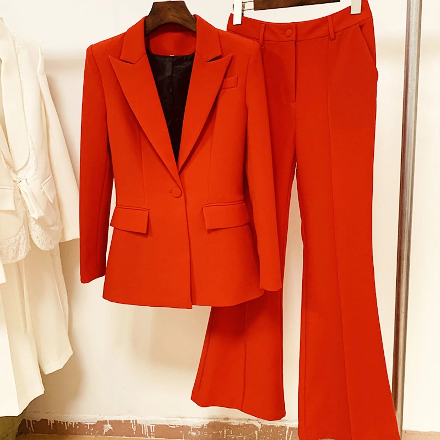 Fashion Pioneer Women Red Blazer + Flare Long Trousers Suit,  Flare Trouser, light and stretchy. Material: Polyester ,Slim fit and long Sleeves with buttons and two pockets. Great dress for professional wear, casual, formal, business wear , onsite and other special events. Whether for a casual or a professional look, this suit blazer definitely makes you stunning. This Blazer comes with set and full lining, soft and comfortable to Wear.