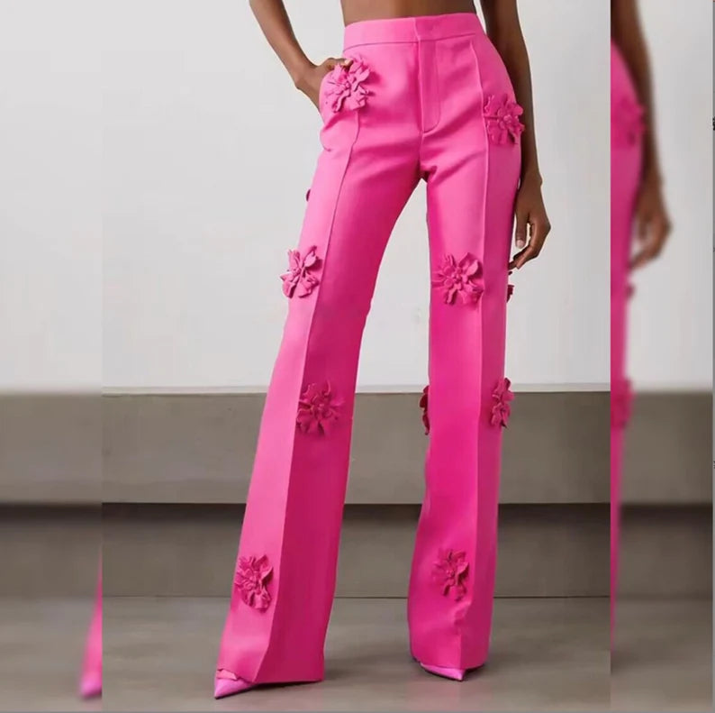 Hot Pink 3D Flower Decorate Hot pink Loose fit blazer and flare trouser Unique style stage perfomance dinner wear party wear The vibrant colors and unique style of this pantsuit are sure to impress. Perfect for any special occasion such as a stage performance, dinner, or party, the Hot Pink 3D Flower Decorate Loose Fit Blazer and Mid-High Rise Flare Trousers Pantsuit Suit is sure to turn heads.