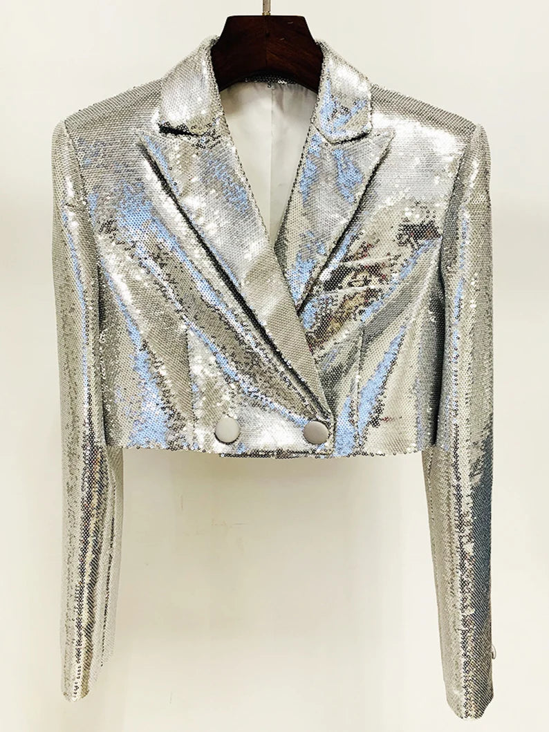 Women Bling Bling Silver Sequinned Crop Blazer Jacket + Mini Skirt Suit  This Bling bling fully sequinned suit will make you a star in any special event such as party, clubbing, stage performance and so on. If you are looking for something extraordinary and eye-catching, this is the perfect outfit for you! The blazer jacket is designed with full sequinned material, cropped length and V-neck collar. The mini skirt is designed with fully sequinned material too, high waist and mini length.