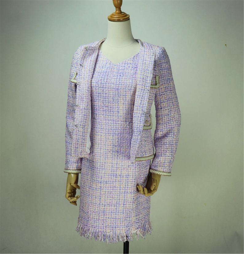 Women's Designer Inspired Purple Tweed Blazer Suit UK CUSTOMER SERVICE! Women's Designer Inspired Purple Tweed Blazer Suit - Breathe feminine flair into your wardrobe with this purple coloured round-neck blouse, pearl button with four pockets. It's crafted from light, look like diamond textured fabric. Suitable for day or night, it can be tucked into a pencil skirt with tassel. As per customer requirement our tailor will stitch the suit accordingly.