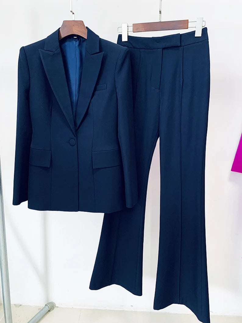 For women, a navy one-button blazer is worn with mid-high flare pants.   Women's casual blazer suits are constructed of a polyester blend. It is comfortable to wear all year round because of its resilience and suppleness. Using stretch fabric weaves allows for the fabrication of extremely slim-fitting forms and the preservation of a desirable fit.
