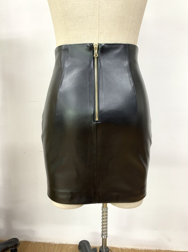 Women's Faux Leather Black Fitted Blazer + Skirt Black,  your go-to for all the latest trends, no matter who you are, where you’re from and what you’re up to. Elevate your look with this must-have blazer. Featuring a black faux leather material with a drop collar and an open front design. Team this with a simple crop top, faux leather bottoms and chunky boots for a combo that's sure to have all eyes on you for all the right reasons.