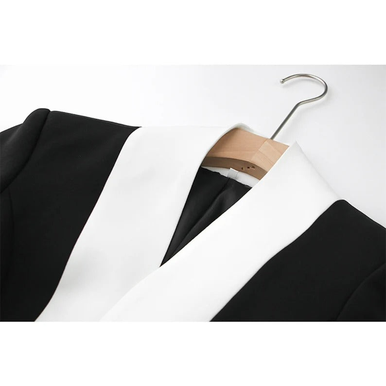 White Collar Shawl Black Blazer for Women - notched lapels ,front button fastening, long sleeves, jetted chest pocket ,two side flap pockets. Women Blazer can use for official use, Business site, Inauguration, Ceremony and Events. This blazer will keep you looking sharp during business meetings or other professional occasions. Fully lined with functional front pockets, this double breasted jacket fuses style and substance. 
