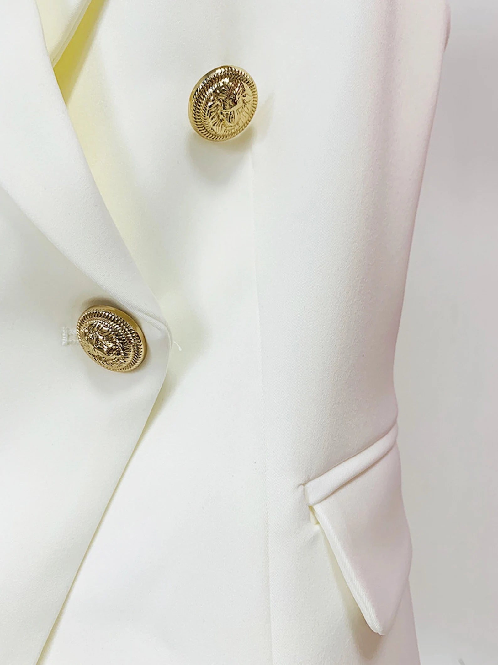 Women's Golden Lion Buttons Fitted Blazer Style Vest White  Gold-tone buttons provide a touch of nautical appeal to this blazer, while the ponte fabric gives it a comfortable yet polished style for classy to elegant for your professional everyday office work. Casual, work, business travels, meetings, formal, dinner dates, hangouts, and other special events are all appropriate occasions.